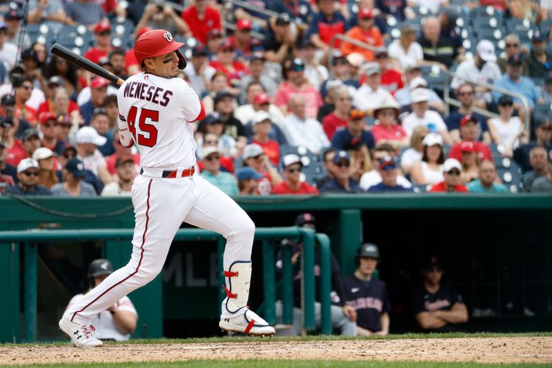 Apr 16, 2023; Washington, District of Columbia, USA; Washington Nationals first baseman Joey Meneses (45) hits a go-ahead RBI single against the Cleveland Guardians during the eighth inning at Nationals Park. Mandatory Credit: Geoff Burke-USA TODAY Sports