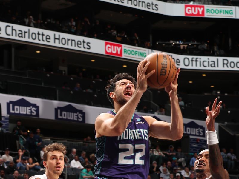 CHARLOTTE, NC - MARCH 5: Vasilije Micic #22 of the Charlotte Hornets drives to the basket during the game against the Orlando Magic on March 5, 2024 at Spectrum Center in Charlotte, North Carolina. NOTE TO USER: User expressly acknowledges and agrees that, by downloading and or using this photograph, User is consenting to the terms and conditions of the Getty Images License Agreement. Mandatory Copyright Notice: Copyright 2024 NBAE (Photo by Kent Smith/NBAE via Getty Images)