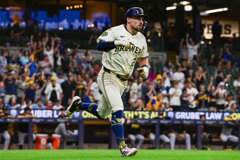 Jun 24, 2025; Milwaukee, Wisconsin, USA;  Milwaukee Brewers third baseman Caleb Durbin (21) runs the bases after hitting a three-run home run in the fourth inning against the Pittsburgh Pirates at American Family Field. Mandatory Credit: Benny Sieu-Imagn Images