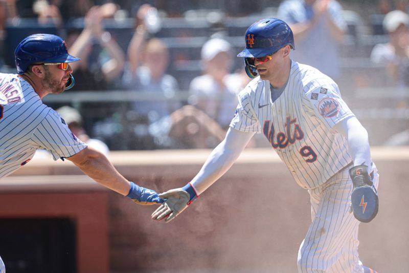 Jul 11, 2024; New York City, New York, USA; New York Mets left fielder Brandon Nimmo (9) celebrates after scoring a run with New York Mets first baseman Pete Alonso (20)  during the fifth inning against the Washington Nationals at Citi Field. Mandatory Credit: Vincent Carchietta-USA TODAY Sports