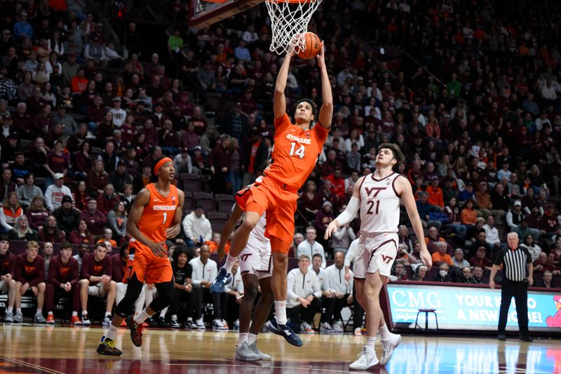 Jan 28, 2023; Blacksburg, Virginia, USA; Syracuse Orange center Jesse Edwards (14) drives to the basket in front of Virginia Tech Hokies forward Grant Basile (21) in the first half at Cassell Coliseum. Mandatory Credit: Lee Luther Jr.-USA TODAY Sports