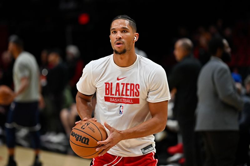 PORTLAND, OREGON - OCTOBER 24: Josh Hart #11 of the Portland Trail Blazers warms up before the game against the Denver Nuggets at Moda Center on October 24, 2022 in Portland, Oregon. NOTE TO USER: User expressly acknowledges and agrees that, by downloading and or using this photograph, User is consenting to the terms and conditions of the Getty Images License Agreement. (Photo by Alika Jenner/Getty Images)