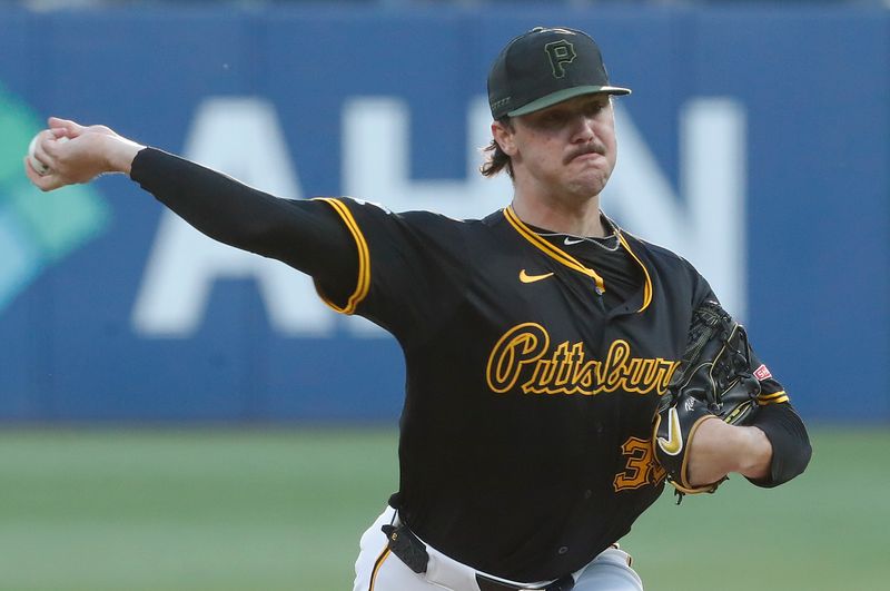 Sep 9, 2024; Pittsburgh, Pennsylvania, USA;  Pittsburgh Pirates starting pitcher Paul Skenes (30) delivers a pitch against the Miami Marlins during the first inning at PNC Park. Mandatory Credit: Charles LeClaire-Imagn Images