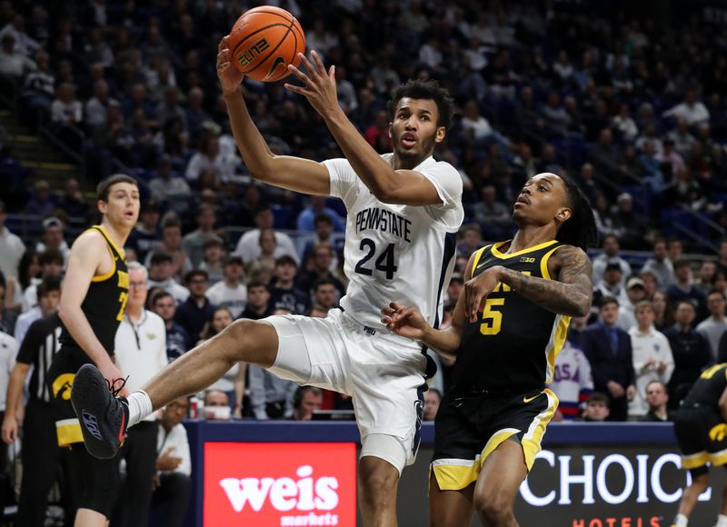 Feb 8, 2024; University Park, Pennsylvania, USA; Penn State Nittany Lions forward Zach Hicks (24) reaches for the rebound during the first half against the Iowa Hawkeyes at Bryce Jordan Center. Penn State defeated Iowa 89-79. Mandatory Credit: Matthew O'Haren-USA TODAY Sports