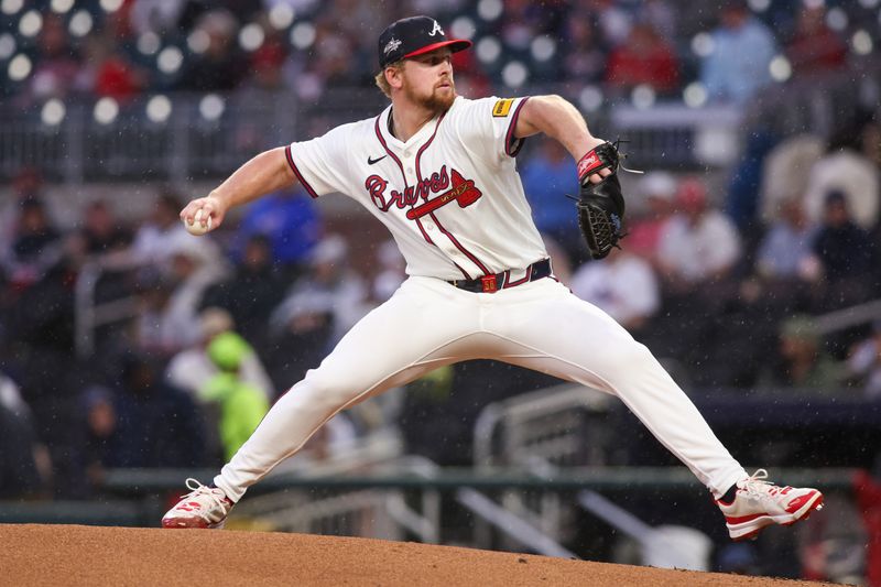 Apr 10, 2025; Atlanta, Georgia, USA; Atlanta Braves starting pitcher Spencer Schwellenbach (56) throws against the Philadelphia Phillies in the third inning at Truist Park. Mandatory Credit: Brett Davis-Imagn Images
