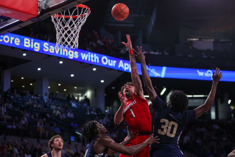 Feb 1, 2025; Atlanta, Georgia, USA; Louisville Cardinals guard J'Vonne Hadley (1) shoots against the Georgia Tech Yellow Jackets in the first half at McCamish Pavilion. Mandatory Credit: Brett Davis-Imagn Images