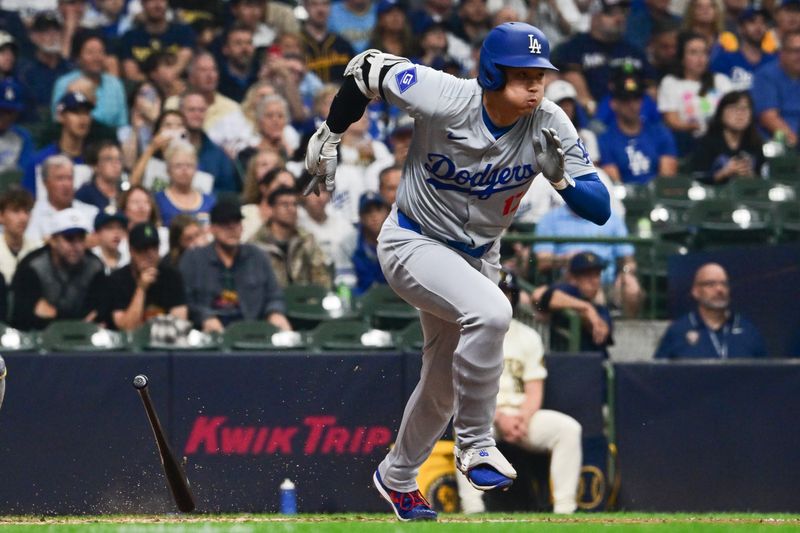 Aug 15, 2024; Milwaukee, Wisconsin, USA; Los Angeles Dodgers designated hitter Shohei Ohtani (17) grounds out against the Milwaukee Brewers in the third inning at American Family Field. Mandatory Credit: Benny Sieu-USA TODAY Sports