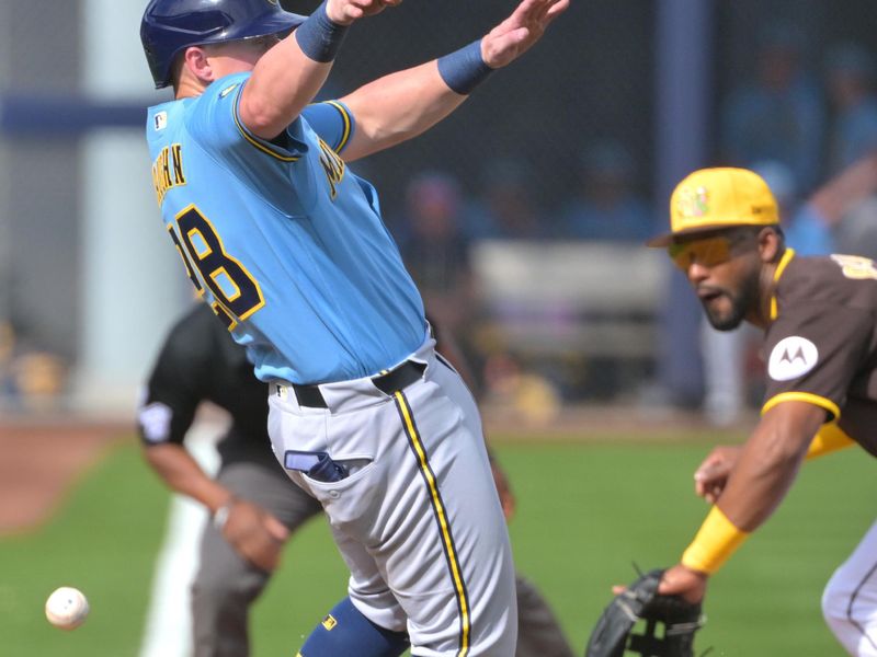 Feb 23, 2026; Peoria, Arizona, USA;  Milwaukee Brewers first baseman Andrew Vaughn (28) avoids a foul ball up the line at third in the fifth inning against the Milwaukee Brewers at Peoria Sports Complex. Mandatory Credit: Jayne Kamin-Oncea-Imagn Images