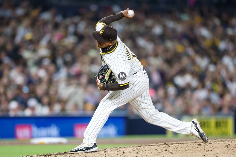 May 31, 2025; San Diego, California, USA; San Diego Padres relief pitcher Bradgley Rodriguez (72) throws a pitch during the seventh inning against the Pittsburgh Pirates at Petco Park. Mandatory Credit: David Frerker-Imagn Images