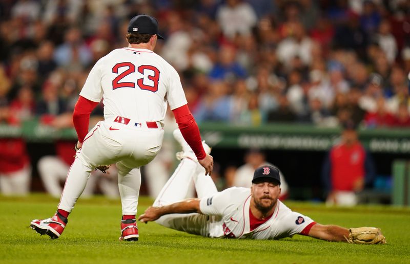 Aug 29, 2024; Boston, Massachusetts, USA; Boston Red Sox relief pitcher Greg Weissert (57) catches the bunt by the Toronto Blue Jays in the ninth inning at Fenway Park. Mandatory Credit: David Butler II-USA TODAY Sports