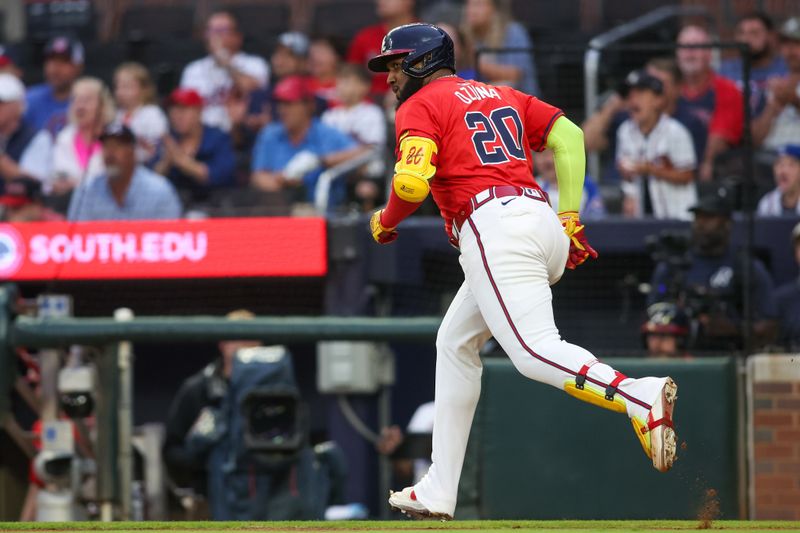 Sep 6, 2024; Atlanta, Georgia, USA; Atlanta Braves designated hitter Marcell Ozuna (20) hits a single against the Toronto Blue Jays in the first inning at Truist Park. Mandatory Credit: Brett Davis-Imagn Images
