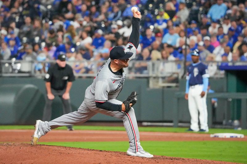 Sep 6, 2024; Kansas City, Missouri, USA; Minnesota Twins pitcher Caleb Thielbar (56) delivers a pitch agains the Kansas City Royals in the eighth inning at Kauffman Stadium. Mandatory Credit: Denny Medley-Imagn Images