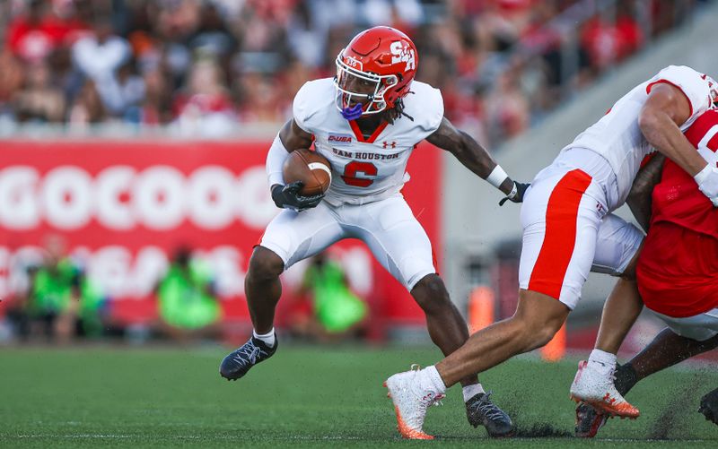 Sep 23, 2023; Houston, Texas, USA; Sam Houston State Bearkats wide receiver Noah Smith (6) runs with the ball during the first quarter against the Houston Cougars at TDECU Stadium. Mandatory Credit: Troy Taormina-USA TODAY Sports