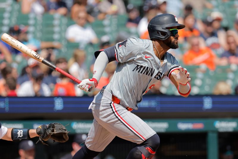 Jul 28, 2024; Detroit, Michigan, USA;  Minnesota Twins second baseman Willi Castro (50) hits a single in the seventh inning against the Detroit Tigers at Comerica Park. Mandatory Credit: Rick Osentoski-USA TODAY Sports