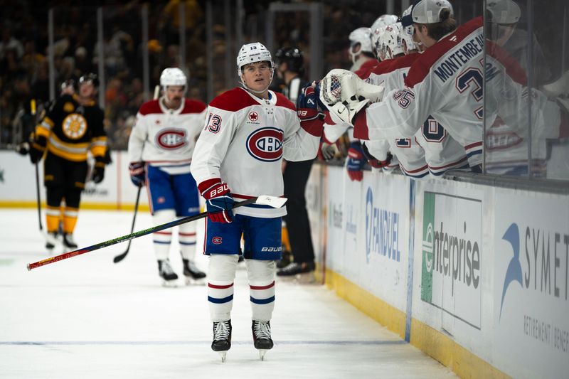 Dec 1, 2024; Boston, Massachusetts, USA; Montreal Canadiens right wing Cole Caufield (13) celebrates a goal against the Boston Bruins in the third period of a game at the TD Garden. Mandatory Credit: Natalie Reid-Imagn Images