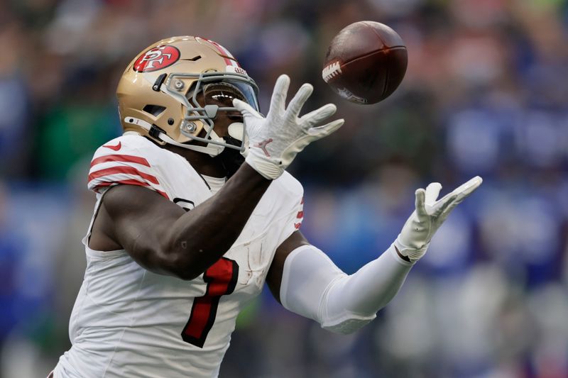 San Francisco 49ers wide receiver Deebo Samuel Sr. males catch during the first half of an NFL football game against the Seattle Seahawks, Thursday, Oct. 10, 2024, in Seattle. (AP Photo/John Froschauer)