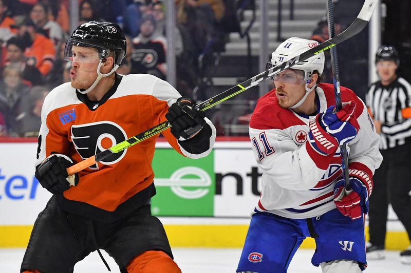 Jan 10, 2024; Philadelphia, Pennsylvania, USA; Montreal Canadiens right wing Brendan Gallagher (11) and Philadelphia Flyers defenseman Nick Seeler (24) battle for position during the second period at Wells Fargo Center. Mandatory Credit: Eric Hartline-USA TODAY Sports