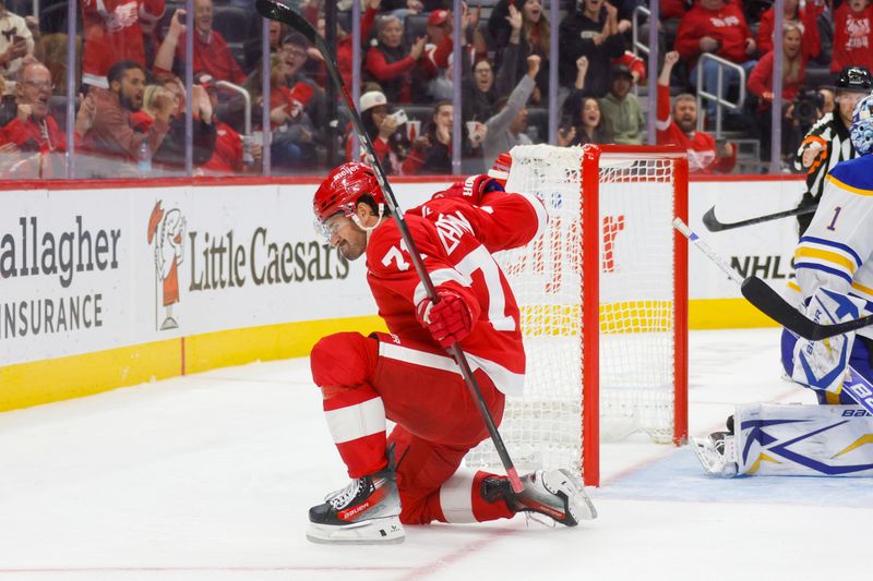 Nov 2, 2024; Detroit, Michigan, USA; Detroit Red Wings center Dylan Larkin (71) celebrates a goal in the second period of the game against the Buffalo Sabres at Little Caesars Arena. Mandatory Credit: Brian Bradshaw Sevald-Imagn Images