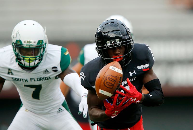 Oct 3, 2020; Cincinnati, OH, USA; Cincinnati Bearcats wide receiver Jayshon Jackson (2) makes the juggling catch during the third quarter against the South Florida Bulls at Nippert Stadium. Mandatory Credit: Joseph Maiorana-USA TODAY Sports