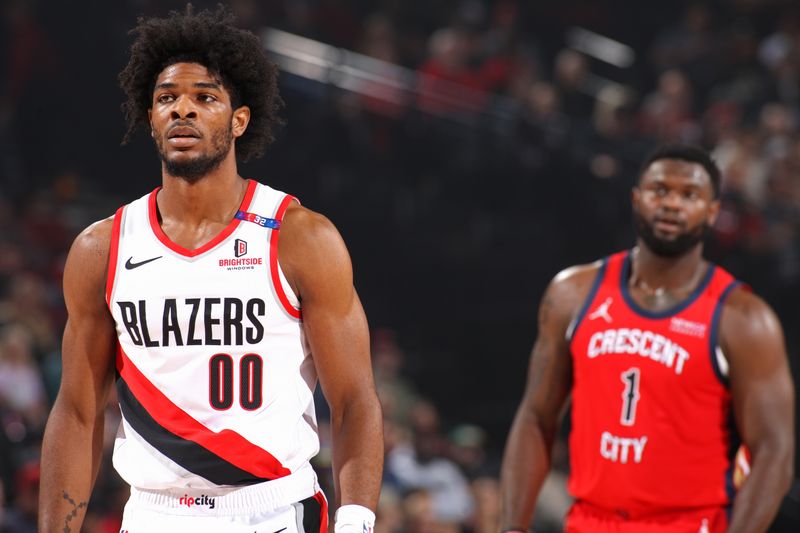 PORTLAND, OR - OCTOBER 27: Scoot Henderson #00 of the Portland Trail Blazers looks on during the game against the New Orleans Pelicans on October 27, 2024 at the Moda Center Arena in Portland, Oregon. NOTE TO USER: User expressly acknowledges and agrees that, by downloading and or using this photograph, user is consenting to the terms and conditions of the Getty Images License Agreement. Mandatory Copyright Notice: Copyright 2024 NBAE (Photo by Cameron Browne/NBAE via Getty Images)