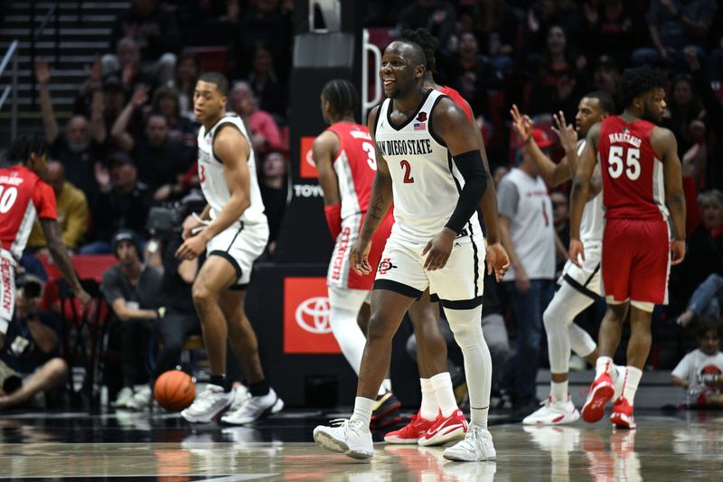 Feb 11, 2023; San Diego, California, USA; San Diego State Aztecs guard Adam Seiko (2) reacts after a three-point basket during the second half against the UNLV Rebels at Viejas Arena. Mandatory Credit: Orlando Ramirez-USA TODAY Sports