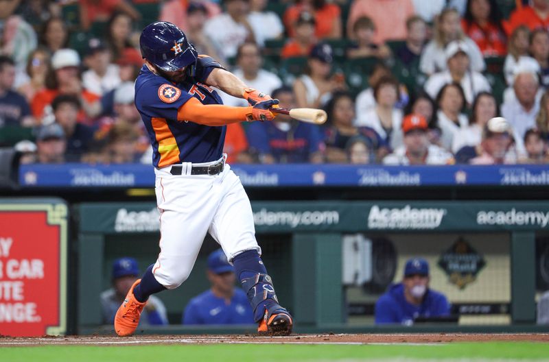 Sep 24, 2023; Houston, Texas, USA; Houston Astros second baseman Jose Altuve (27) hits a single during the first inning against the Kansas City Royals at Minute Maid Park. Mandatory Credit: Troy Taormina-USA TODAY Sports