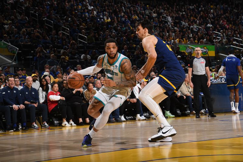 SAN FRANCISCO, CA - FEBRUARY 23: Miles Bridges #0 of the Charlotte Hornets drives to the basket during the game against the Golden State Warriors on February 23, 2024 at Chase Center in San Francisco, California. NOTE TO USER: User expressly acknowledges and agrees that, by downloading and or using this photograph, user is consenting to the terms and conditions of Getty Images License Agreement. Mandatory Copyright Notice: Copyright 2024 NBAE (Photo by Noah Graham/NBAE via Getty Images)