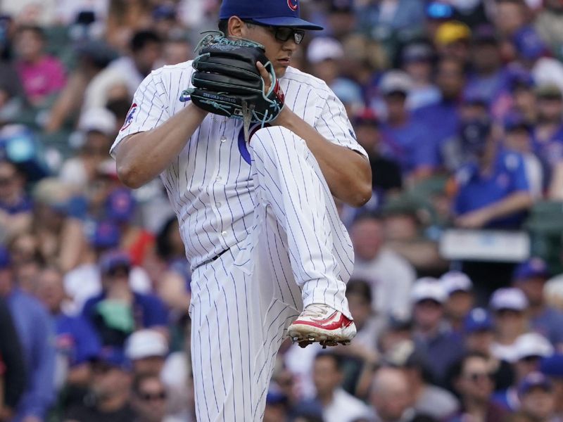 Jun 23, 2024; Chicago, Illinois, USA; Chicago Cubs pitcher Javier Assad (72) throws the ball against the New York Mets during the first inning at Wrigley Field. Mandatory Credit: David Banks-USA TODAY Sports