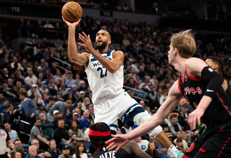 MINNEAPOLIS, MINNESOTA - APRIL 3: Rudy Gobert #27 of the Minnesota Timberwolves shoots the ball as he is fouled in the fourth quarter of the game against the Toronto Raptors at Target Center on April 3, 2024 in Minneapolis, Minnesota. NOTE TO USER: User expressly acknowledges and agrees that, by downloading and or using this photograph, User is consenting to the terms and conditions of the Getty Images License Agreement. (Photo by Stephen Maturen/Getty Images)