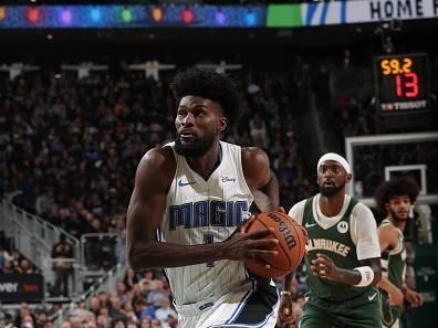 MILWAUKEE, WI - DECEMBER 21: Jonathan Isaac #1 of the Orlando Magic drives to the basket during the game against the Milwaukee Bucks  on December 21, 2023 at the Fiserv Forum Center in Milwaukee, Wisconsin. NOTE TO USER: User expressly acknowledges and agrees that, by downloading and or using this Photograph, user is consenting to the terms and conditions of the Getty Images License Agreement. Mandatory Copyright Notice: Copyright 2023 NBAE (Photo by Gary Dineen/NBAE via Getty Images).