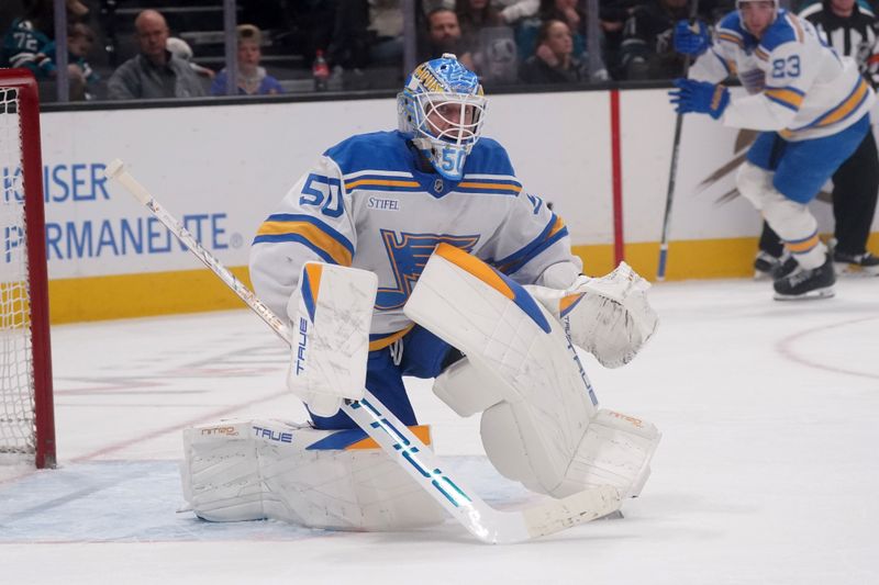 Mar 6, 2026; San Jose, California, USA; St. Louis Blues goalie Jordan Binnington (50) defends the goal against the San Jose Sharks in the second period at SAP Center at San Jose. Mandatory Credit: David Gonzales-Imagn Images