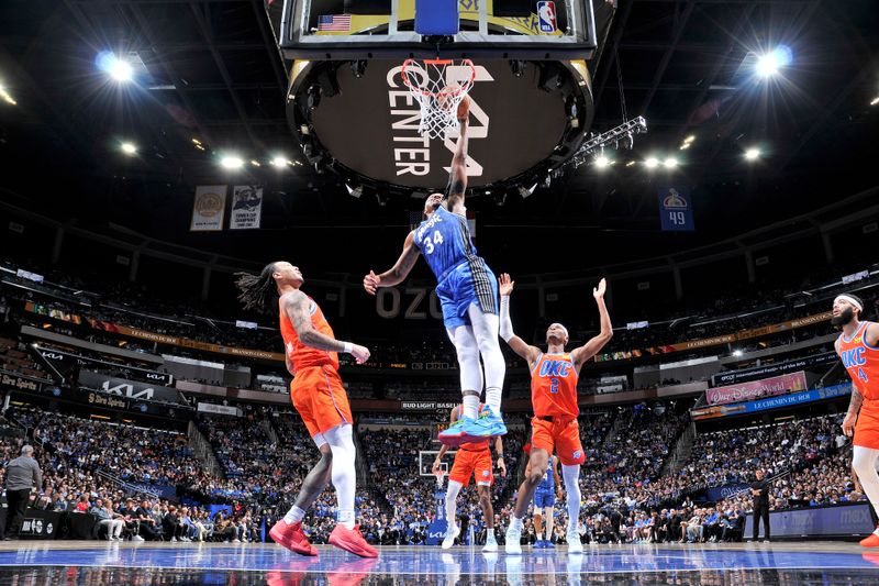 ORLANDO, FL - FEBRUARY 13: Wendell Carter Jr. #34 of the Orlando Magic dunks the ball during the game against the Oklahoma City Thunder on February 13, 2024 at the Kia Center in Orlando, Florida. NOTE TO USER: User expressly acknowledges and agrees that, by downloading and or using this photograph, User is consenting to the terms and conditions of the Getty Images License Agreement. Mandatory Copyright Notice: Copyright 2024 NBAE (Photo by Fernando Medina/NBAE via Getty Images)