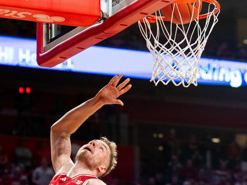 Feb 25, 2024; Lincoln, Nebraska, USA; Nebraska Cornhuskers forward Rienk Mast (51) shoots the ball against the Minnesota Golden Gophers during the first half at Pinnacle Bank Arena. Mandatory Credit: Dylan Widger-USA TODAY Sports