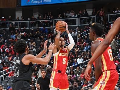 ATLANTA, GA - NOVEMBER 22: Dejounte Murray #5 of the Atlanta Hawks shoots the ball during the game against the Brooklyn Nets on November 22, 2023 at State Farm Arena in Atlanta, Georgia.  NOTE TO USER: User expressly acknowledges and agrees that, by downloading and/or using this Photograph, user is consenting to the terms and conditions of the Getty Images License Agreement. Mandatory Copyright Notice: Copyright 2023 NBAE (Photo by Scott Cunningham/NBAE via Getty Images)