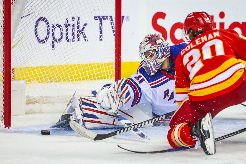 Oct 24, 2023; Calgary, Alberta, CAN; New York Rangers goaltender Igor Shesterkin (31) makes a save against Calgary Flames center Blake Coleman (20) during the second period at Scotiabank Saddledome. Mandatory Credit: Sergei Belski-USA TODAY Sports