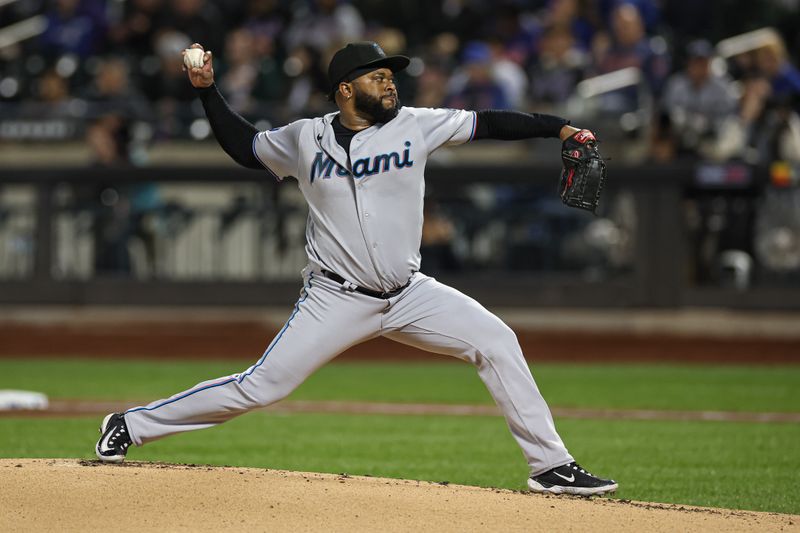 Sep 27, 2023; New York, NY, USA; Miami Marlins starting pitcher Johnny Cueto (47) delivers a pitch during the first inning against the New York Mets at Citi Field.  Mandatory Credit: Vincent Carchietta-USA TODAY Sports