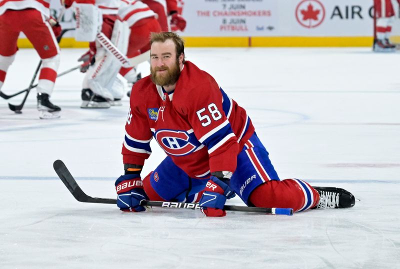 Apr 16, 2024; Montreal, Quebec, CAN; Montreal Canadiens defenseman David Savard (58) stretches during the warmup period before the game against the Detroit Red Wings at the Bell Centre. Mandatory Credit: Eric Bolte-USA TODAY Sports