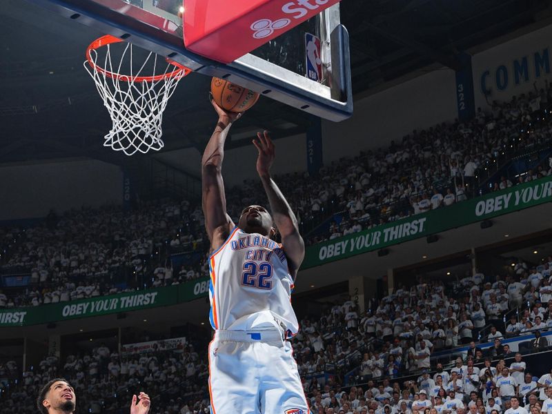 OKLAHOMA CITY, OK - JUNE 5: Cason Wallace #22 of the Oklahoma City Thunder drives to the basket during the game against the Indiana Pacers  during Game One of the 2025 NBA Finals on June 5, 2025 at Paycom Center in Oklahoma City, Oklahoma. NOTE TO USER: User expressly acknowledges and agrees that, by downloading and or using this photograph, User is consenting to the terms and conditions of the Getty Images License Agreement. Mandatory Copyright Notice: Copyright 2025 NBAE (Photo by Jesse D. Garrabrant/NBAE via Getty Images)