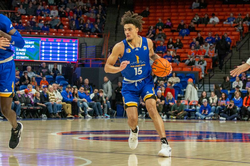 Jan 3, 2023; Boise, Idaho, USA; San Jose State Spartans forward Trey Anderson (15) dribbles the ball during the first half against the Boise State Broncos at ExtraMile Arena. Mandatory Credit: Brian Losness-USA TODAY Sports