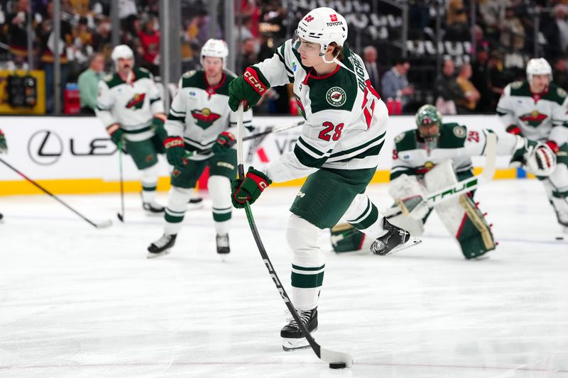 Apr 12, 2024; Las Vegas, Nevada, USA; Minnesota Wild left wing Liam Ohgren (28) warms up before the start of a game against the Vegas Golden Knights at T-Mobile Arena. Mandatory Credit: Stephen R. Sylvanie-USA TODAY Sports