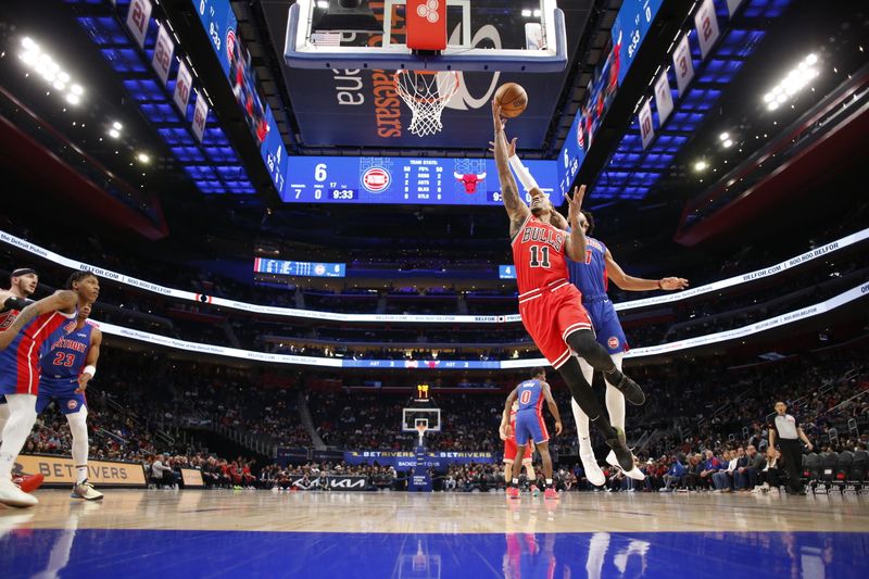 DETROIT, MI - APRIL 11: DeMar DeRozan #11 of the Chicago Bulls shoots the ball during the game against the Detroit Pistons on April 11, 2024 at Little Caesars Arena in Detroit, Michigan. NOTE TO USER: User expressly acknowledges and agrees that, by downloading and/or using this photograph, User is consenting to the terms and conditions of the Getty Images License Agreement. Mandatory Copyright Notice: Copyright 2024 NBAE (Photo by Brian Sevald/NBAE via Getty Images)