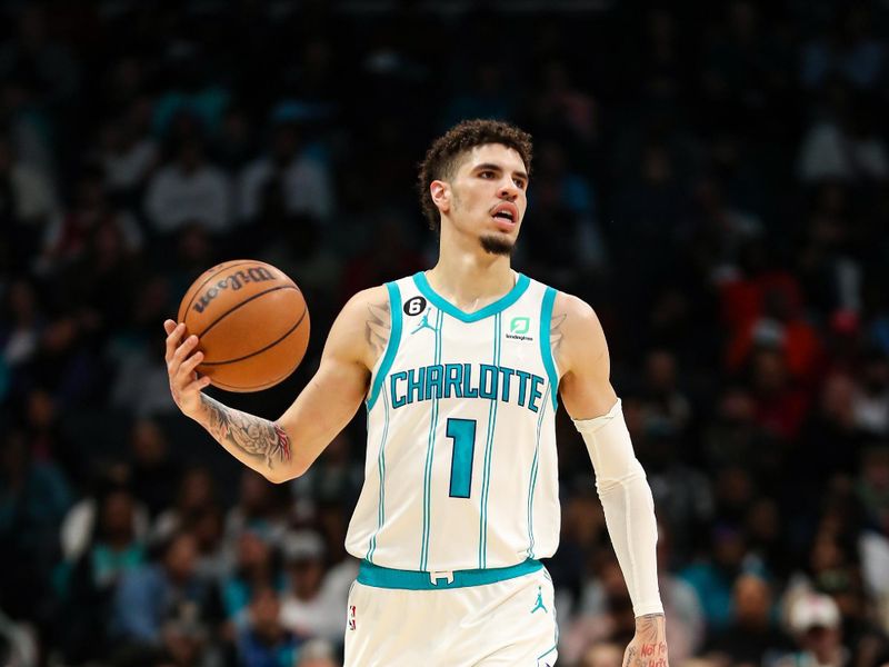 CHARLOTTE, NC - JANUARY 4: LaMelo Ball #1 of the Charlotte Hornets dribbles the ball during the game against the Memphis Grizzlies on January 4, 2023 at Spectrum Center in Charlotte, North Carolina. NOTE TO USER: User expressly acknowledges and agrees that, by downloading and or using this photograph, User is consenting to the terms and conditions of the Getty Images License Agreement. Mandatory Copyright Notice: Copyright 2023 NBAE (Photo by Brock Williams-Smith/NBAE via Getty Images)