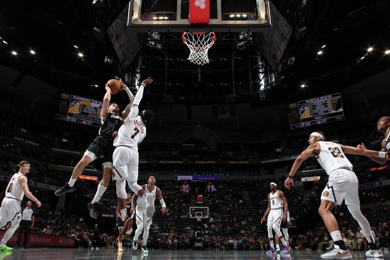 MEMPHIS, TN - APRIL 14: Scotty Pippen Jr. #1 of the Memphis Grizzlies drives to the basket during the game against the Denver Nuggets on April 14, 2024 at FedExForum in Memphis, Tennessee. NOTE TO USER: User expressly acknowledges and agrees that, by downloading and or using this photograph, User is consenting to the terms and conditions of the Getty Images License Agreement. Mandatory Copyright Notice: Copyright 2024 NBAE (Photo by Joe Murphy/NBAE via Getty Images)