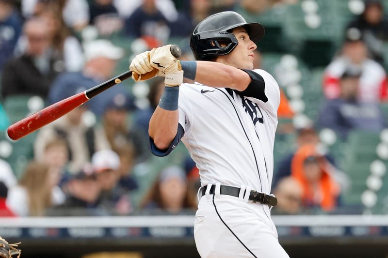 Apr 29, 2023; Detroit, Michigan, USA;  Detroit Tigers third baseman Nick Maton (9) hits a single in the third inning against the Baltimore Orioles at Comerica Park. Mandatory Credit: Rick Osentoski-USA TODAY Sports