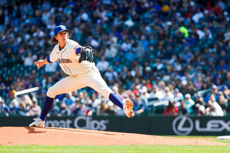 Apr 13, 2025; Seattle, Washington, USA; Seattle Mariners starting pitcher Logan Gilbert (36) throws against the Texas Rangers during the first inning at T-Mobile Park. Mandatory Credit: Joe Nicholson-Imagn Images