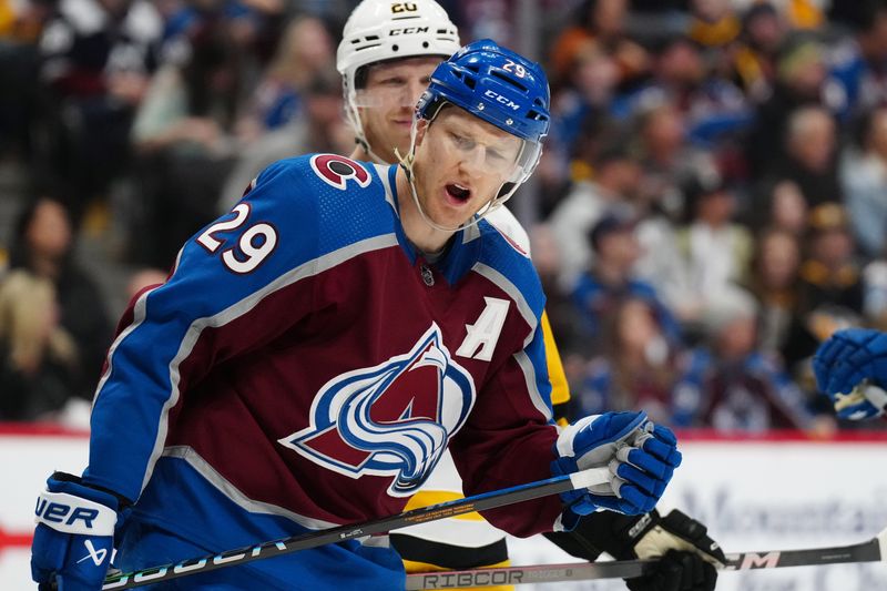 Mar 24, 2024; Denver, Colorado, USA; Colorado Avalanche center Nathan MacKinnon (29) reacts following his goal called off in second period against the Pittsburgh Penguins at Ball Arena. Mandatory Credit: Ron Chenoy-USA TODAY Sports