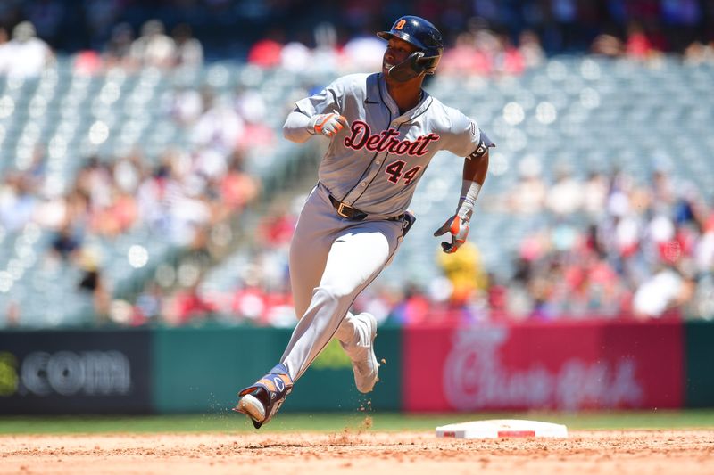 Jun 27, 2024; Anaheim, California, USA; Detroit Tigers designated hitter Justyn-Henry Malloy (44) runs home to score after hitting an inside the park home run against the Los Angeles Angels during the fourth inning at Angel Stadium. Mandatory Credit: Gary A. Vasquez-USA TODAY Sports