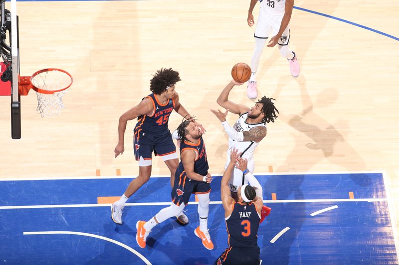 NEW YORK, NY - APRIL 12: Trendon Watford #9 of the Brooklyn Nets shoots the ball during the game against the New York Knicks on April 12, 2024 at Madison Square Garden in New York City, New York.  NOTE TO USER: User expressly acknowledges and agrees that, by downloading and or using this photograph, User is consenting to the terms and conditions of the Getty Images License Agreement. Mandatory Copyright Notice: Copyright 2024 NBAE  (Photo by Nathaniel S. Butler/NBAE via Getty Images)