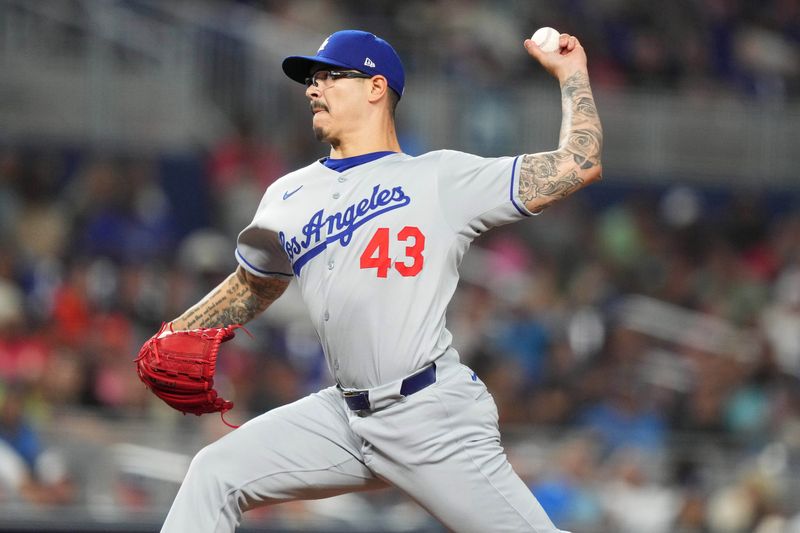 May 6, 2025; Miami, Florida, USA;  Los Angeles Dodgers pitcher Anthony Banda (43) pitches in the eighth inning against the Miami Marlins at loanDepot Park. Mandatory Credit: Jim Rassol-Imagn Images