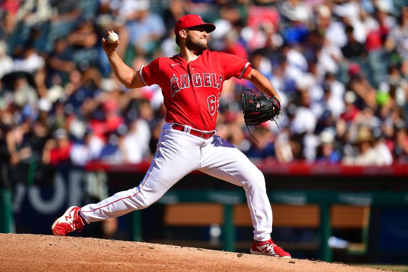 Jul 19, 2023; Anaheim, California, USA; Los Angeles Angels starting pitcher Chase Silseth (63) throws against the New York Yankees during the third inning at Angel Stadium. Mandatory Credit: Gary A. Vasquez-USA TODAY Sports